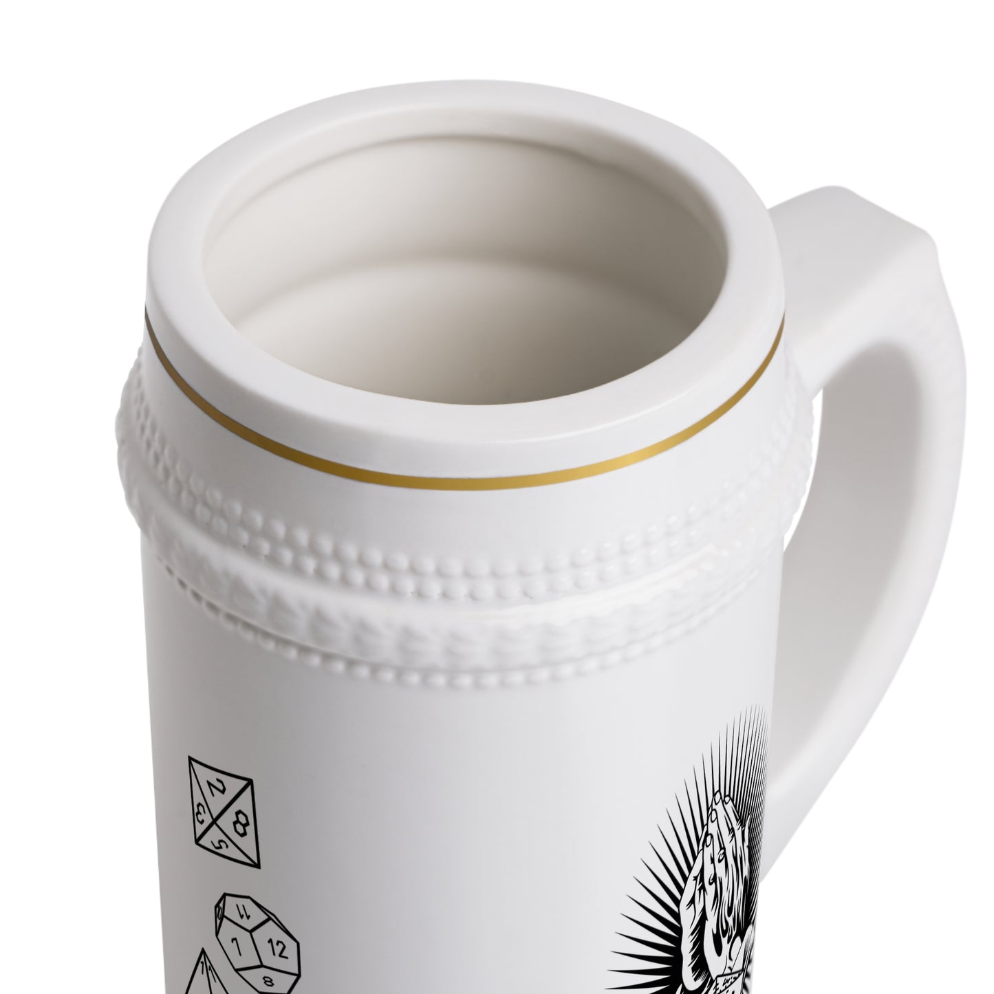 A white ceramic stein with a gold rim and textured detailing along the top and bottom edges. The central design features black line art of two hands in a praying gesture, holding a 20-sided die (d20) against a radiant sunburst background.