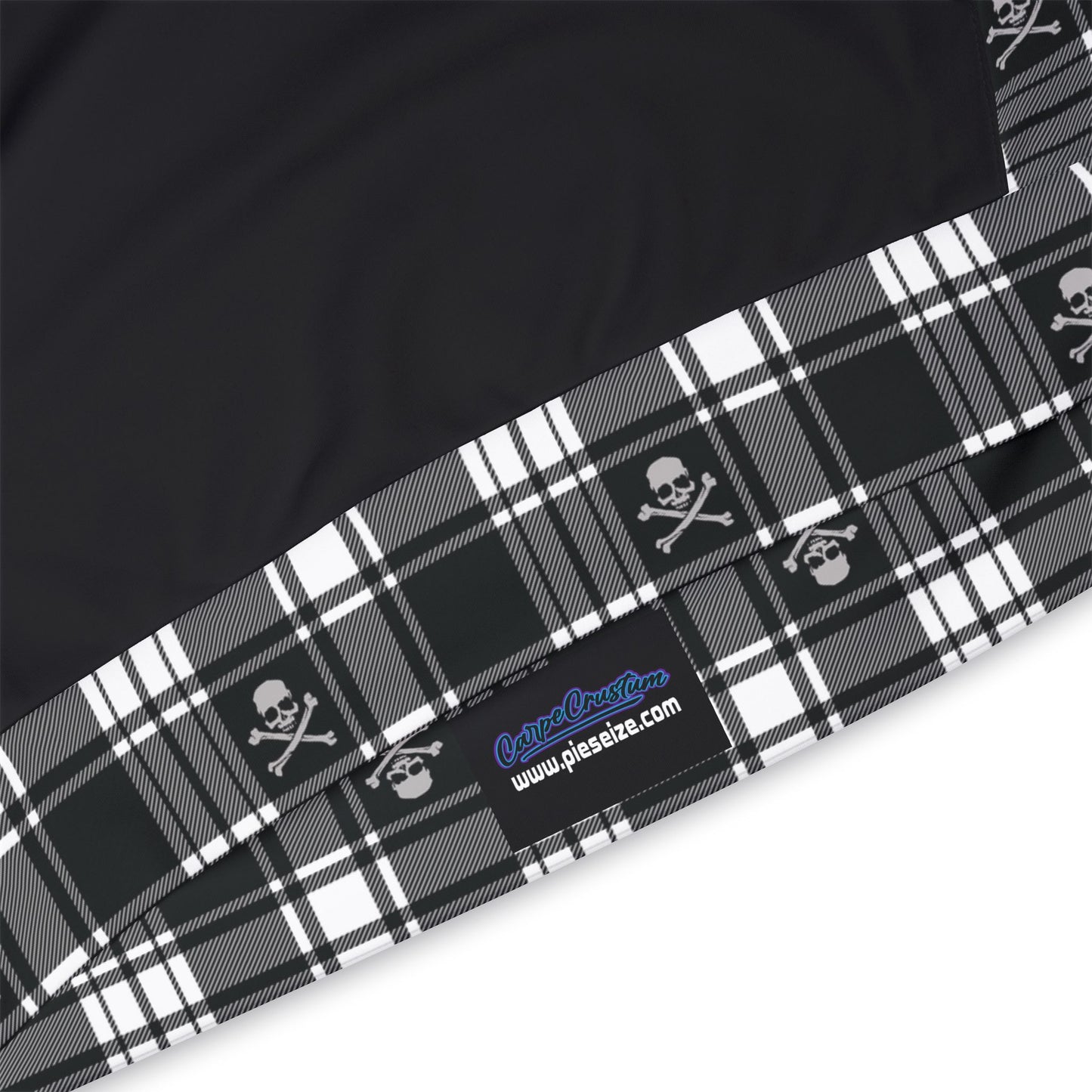 Skull and Crossbones Black/White Plaid Flannel Pattern All Over Print Hoodie tag on the belt line of the garment