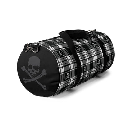 Black and White Flannel Patterned Skull and Crossbones Duffel Bag left side view with a strap clipped on
