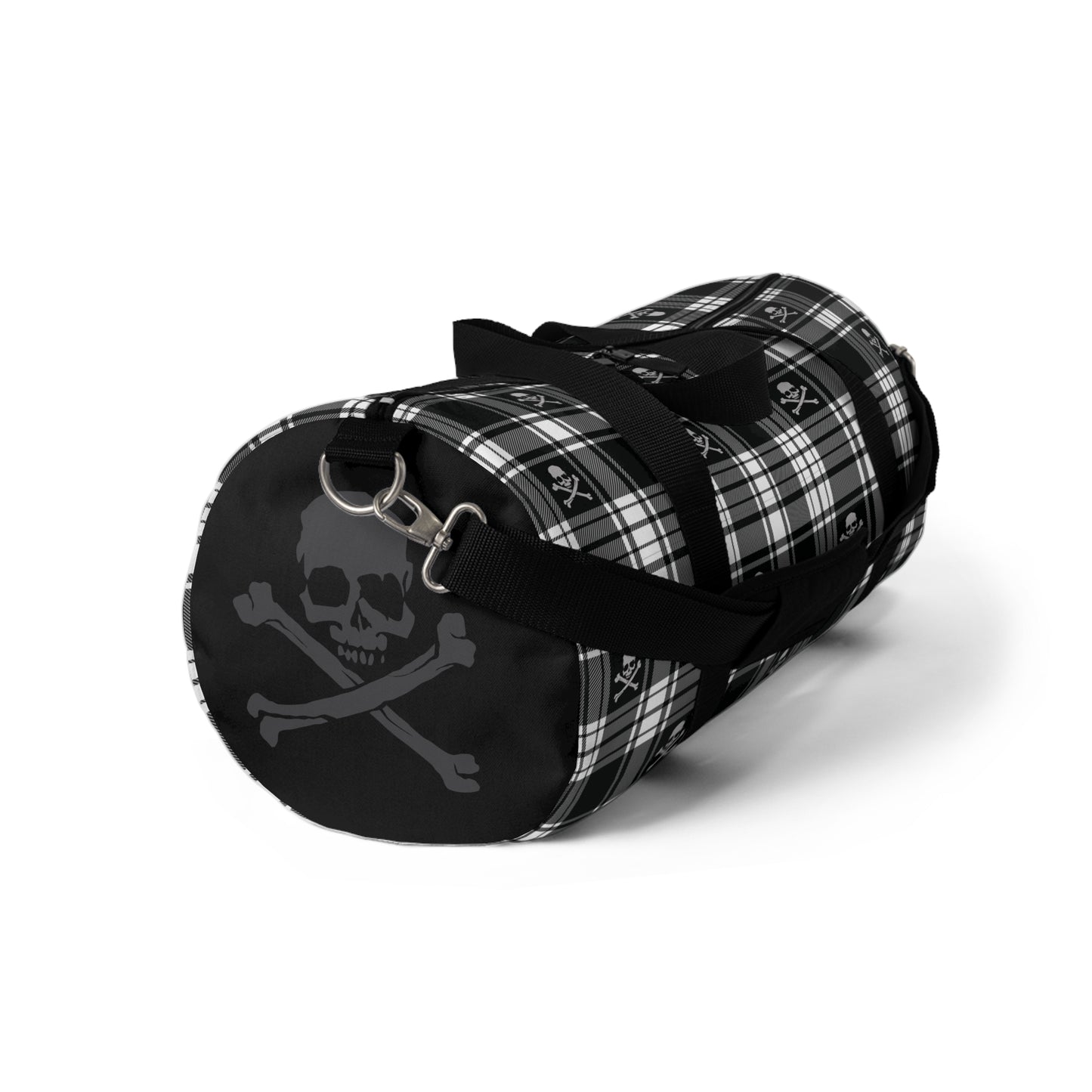 Black and White Flannel Patterned Skull and Crossbones Duffel Bag left side small with strap hanging 