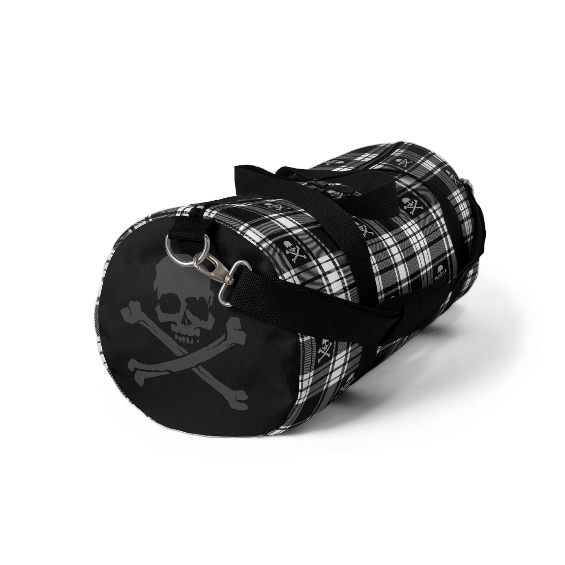 Black and White Flannel Patterned Skull and Crossbones Duffel Bag left side small with strap hanging 